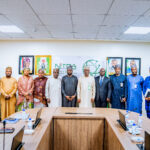 The Director General of the National Information Technology Development Agency (NITDA), Kashifu Inuwa, in a group photograph with the Managing Director and Chief Executive Officer of the Nigerian Independent System Operator (NISO), Abdu Mohammed, alongside members of the management teams of both organisations during a working visit to NITDA's headquarters in Abuja.
